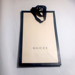Genuine Gucci Shopping Bag with Grosgrain ribbon handles and bag ties.